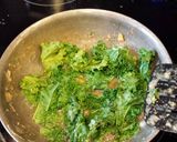 A picture of step 1 of kale,tomato and cream cheese breakfast sandwich.