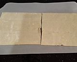 A picture of step 2 of Bacon Wrapped Cheese Breadsticks.