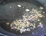 A picture of step 2 of Paanch Phoron Chicken.