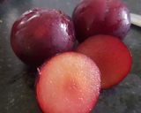 A picture of step 1 of Plum, grape and citrus rind juice.