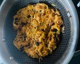 A picture of step 8 of Vasant Panchami Kesar Chawal (Yellow Sweet Rice).