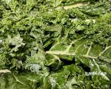 A picture of step 4 of Crispy Kale Chips.