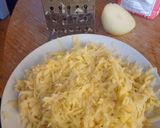 A picture of step 1 of Placki Polish potato pancakes.