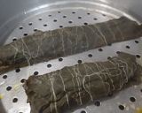 A picture of step 5 of Pabda Paturi (with Taro/ kochu/Alvi leaves) and Pabda Bhappa.