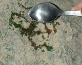 A picture of step 2 of Mixed millet partha with bathua and methi leaves.
