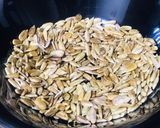 A picture of step 3 of Roasted sunflower seeds & other seeds spiced jaggery brittle.