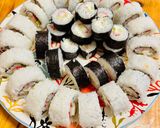A picture of step 6 of Two types of rolls with crab sticks.