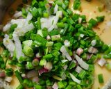 A picture of step 2 of Green Onion chilla.