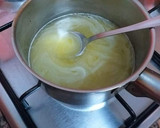 Foto del paso 12 de la receta: Tarta de queso, limón y vainilla con glaseado de pasas al ron