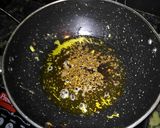 A picture of step 3 of Punjabi kadhi with green peas and coriander rice.