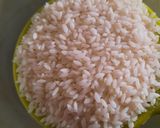 A picture of step 1 of Nolen gurer payesh or Rice kheer with date palm jaggery.