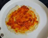 A picture of step 7 of Schezwan sandwich dosa.