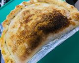 Foto del paso 8 de la receta: 🥟CALZONE🥟 DE PUERROS 🧀QUESO🧀 Y 🍖 JAMÓN🍖 (masa casera) 😋