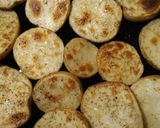 A picture of step 8 of Oven Roasted Potatoes.