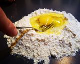 Foto del passaggio 1 della ricetta Ravioli rotondi ripieni di cavolfiore e salsiccia