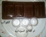 صورة لخطوة 20 من وصفة الواح الشوكولاتةالداكنه