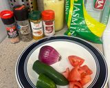 A picture of step 1 of Yellow Rice with Jalapeños and Tomatoes.