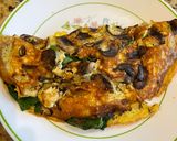 Hình bước làm 2 của món Trứng chiên nấm, rau spinach