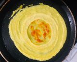 A picture of step 3 of Moong dal chilla stuffed.