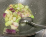 A picture of step 3 of Spring onion soup.