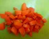 A picture of step 1 of Carrots and moringa noodles.