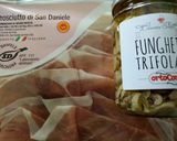 A picture of step 1 of Prosciutto, caprino e funghi salad.