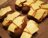 Une image de l'étape 5 de Pommes de terres farcies raclette.