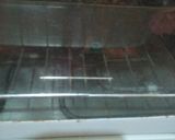 A picture of step 9 of Banana Oats Chocolate Cake.