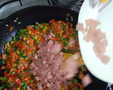 A picture of step 6 of Turmeric fried rice and fried chicken.