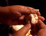 A picture of step 4 of Cheesy kulcha on tawa.