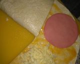 Foto del paso 3 de la receta: Sándwich piña asada, mortadela y queso