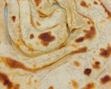 A picture of step 6 of Lachha paratha.