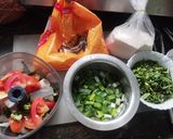 A picture of step 1 of Methi, spring onion appe.
