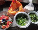 A picture of step 1 of Methi, spring onion appe.