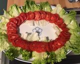 Une image de l'étape 7 de Salade de tomates,scarole,céleri et thon aux radis « fleurs ».