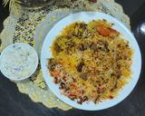 A picture of step 4 of Mutton biryani with boondi and onion cucumber raita.