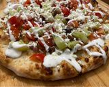 A picture of step 7 of Greek Chicken Pizza.