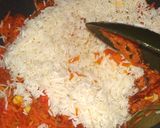 A picture of step 4 of Tomato carrot rice.