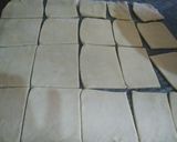 A picture of step 3 of Paneer masala puff in pan.