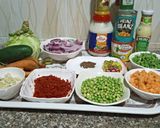 A picture of step 1 of Chinese fried rice with coleslow and fry meat.