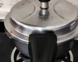 A picture of step 3 of Gajar- beetroot halwa in pressure cooker.