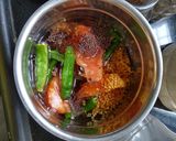A picture of step 1 of Machher Jhaal / Fish in Mustard curry.
