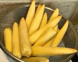 A picture of step 1 of Spicy Crispy Baby Corn Fritters 🌽.