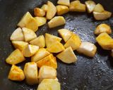 A picture of step 2 of Yam Pulao.