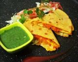 A picture of step 3 of Trending tortilla wraps with cheese.