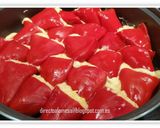 Foto del paso 6 de la receta: Pimientos del piquillo rellenos de merluza y langostinos