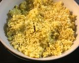 A picture of step 2 of Curry millet grain with black beans and sweet corn.