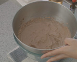 A picture of step 9 of Cocoa Swiss Roll with Chocolate Cream.
