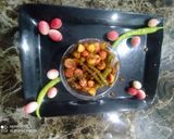 A picture of step 10 of Karonda pickle.