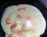 A picture of step 3 of Banana Pancake stuffed with peanut & cheese.